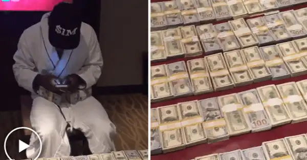 Photos+Video : Floyd Mayweather flaunts $1Million in cash after Kim Kardashian’s robbery